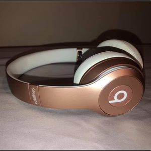 Rose gold beats wireless headphones